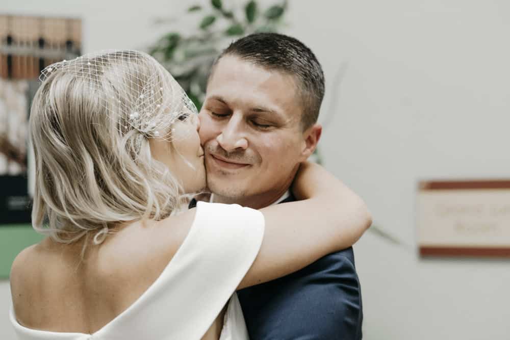 bride and groom kissing