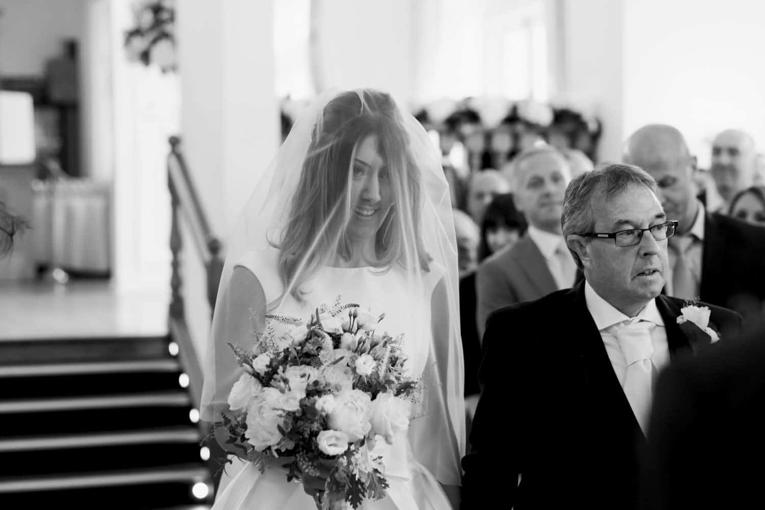 bride and her dad in the aisle